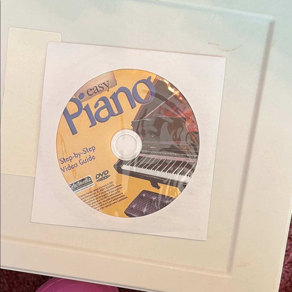 Easy Piano Step-by-Step Video Guide DVD - Yellow Graphic Disc